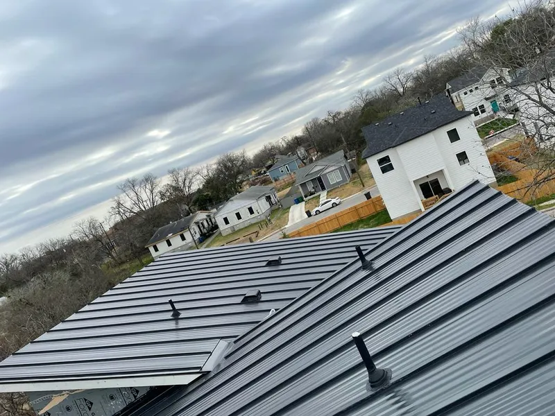 Standing seam metal roof panels with vents for Skylight Repair in Socorro